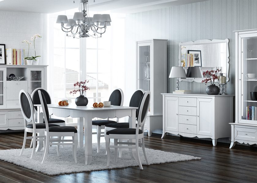 Visualisation shows a dining room with furniture from the Lilly collection, a table with a set of chairs, a display cabinet, a chest of drawers and two narrow display cabinets. Stylish white furniture with decorative fronts, chairs have grey upholstery.