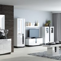 The visualisation shows a modern living room with furniture from the Mystic collection, a chest of drawers, a chest of drawers, a coffee table and a rtv cabinet - furniture made in white gloss with black elements.