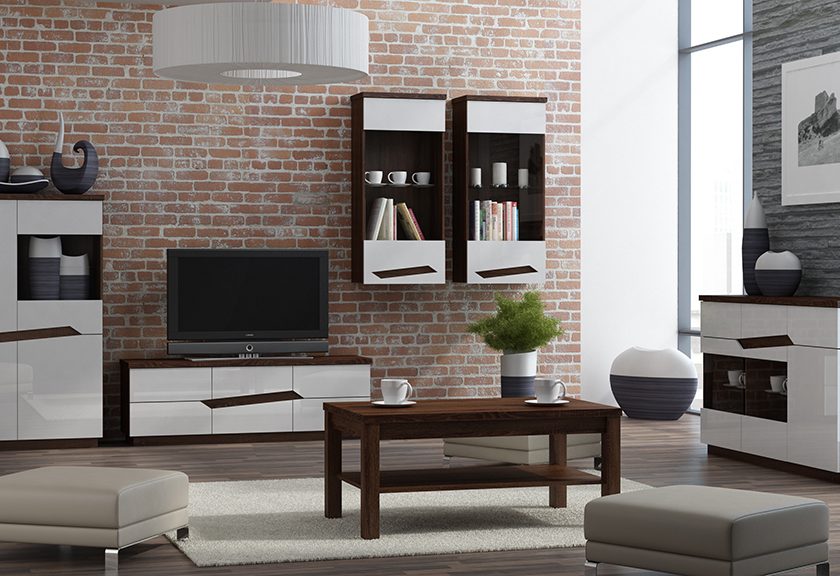 This visualisation presents a modern living room with furniture from the Verdi collection, a colour combination of chocolate with white gloss. The visualisation shows a chest of drawers, display cabinet, rtv cabinet, coffee table and hanging glass cabinets.